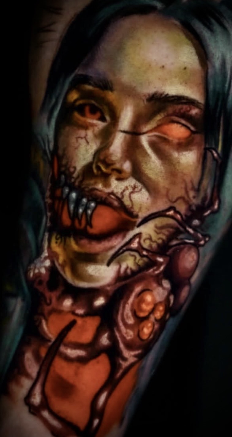 Biomechanical dark portrait tattoo